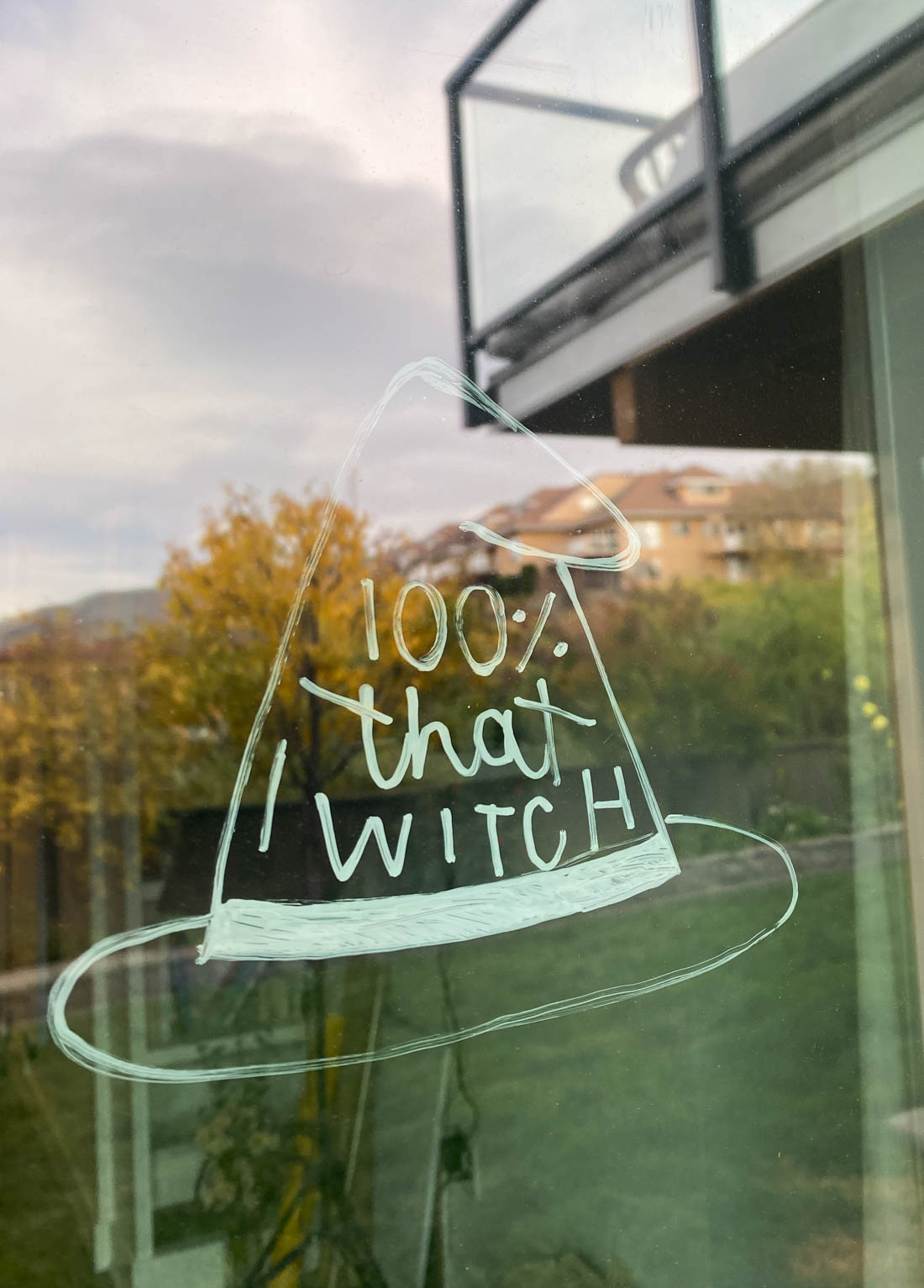 Hand lettering on windows for holiday decor