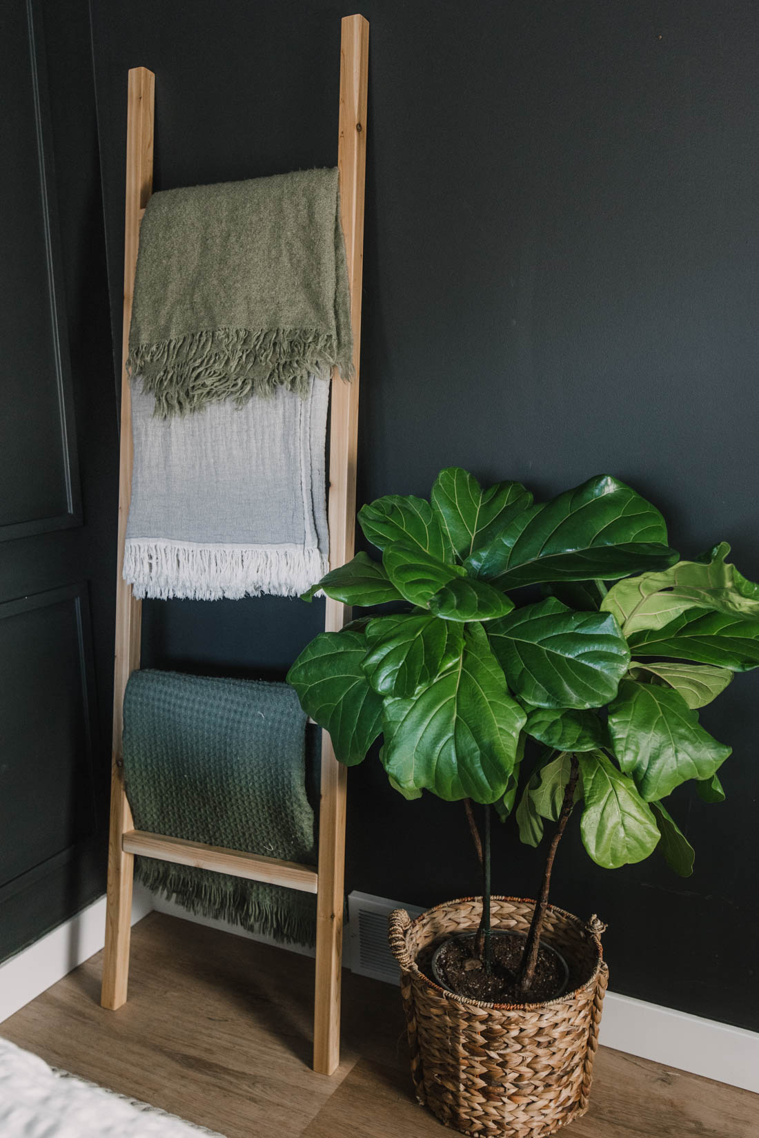 DIY Blanket Ladder in black bedroom