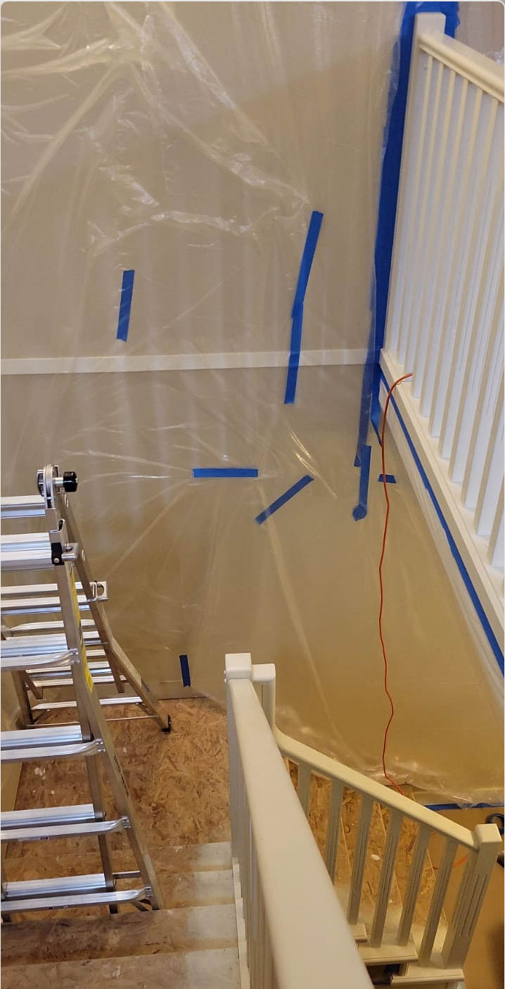 Painting a two story staircase