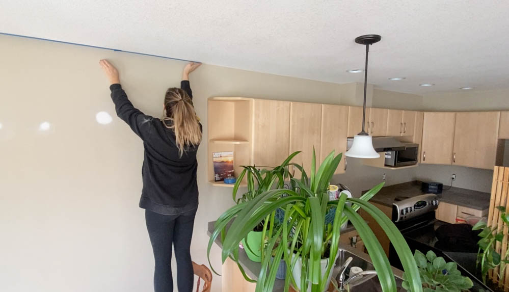 Masking ceilings for painting walls with a sprayer