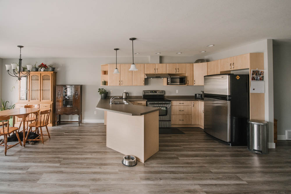 Painting a townhome with a sprayer