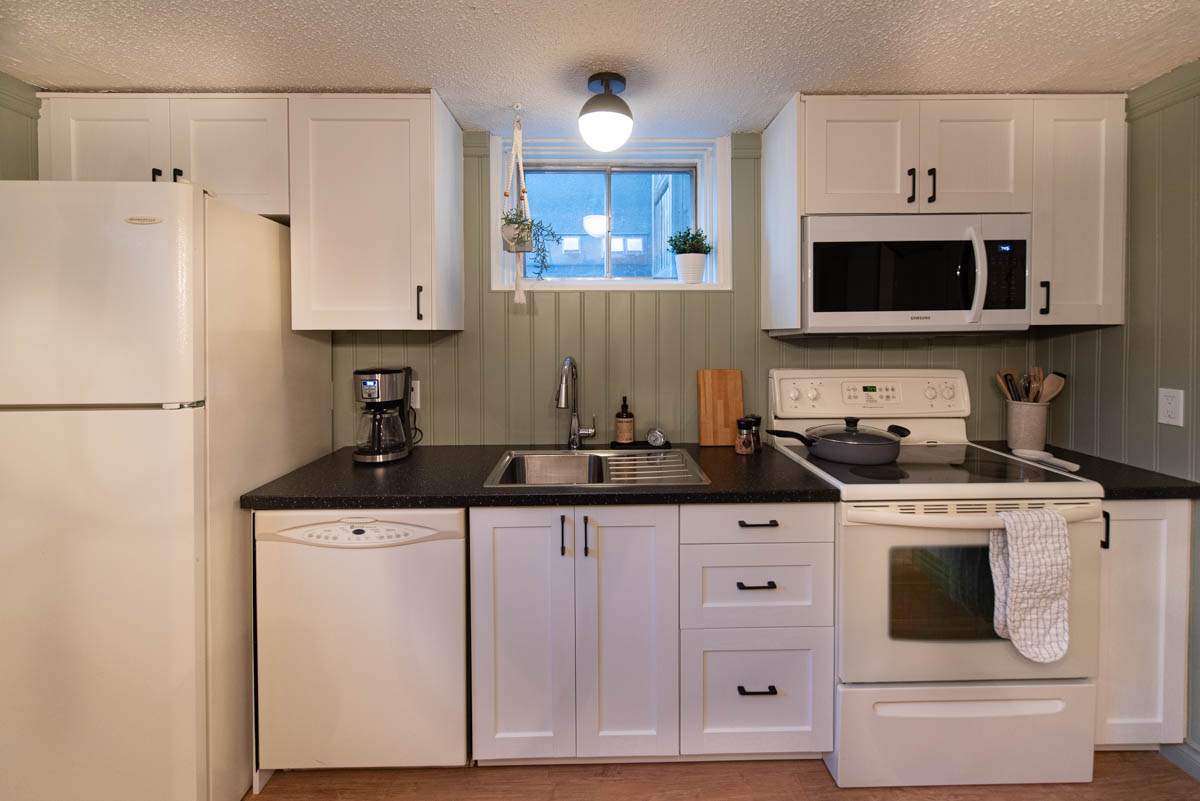 Basement suite kitchen after