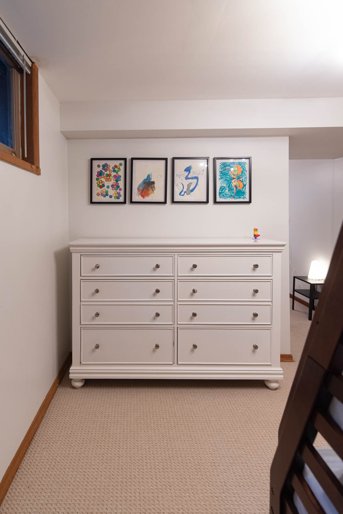 Kids art in a shared bedroom