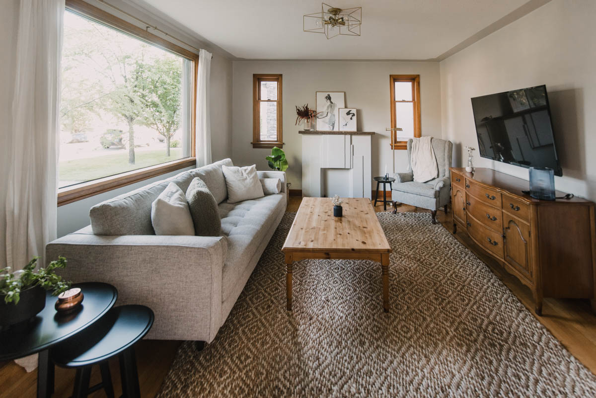 A mix of old and new in this 1945 living room makeover with original wood trim