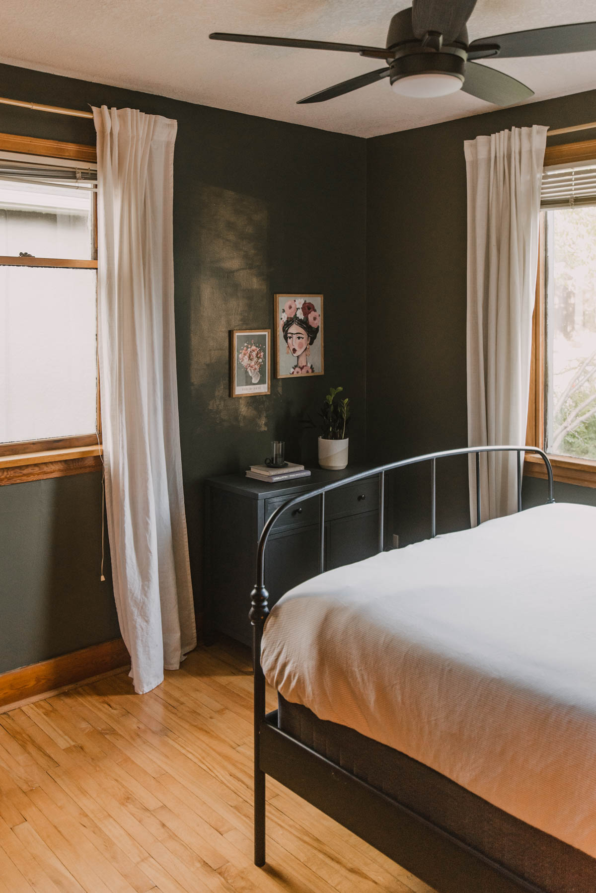 Dark green walls with floral prints 