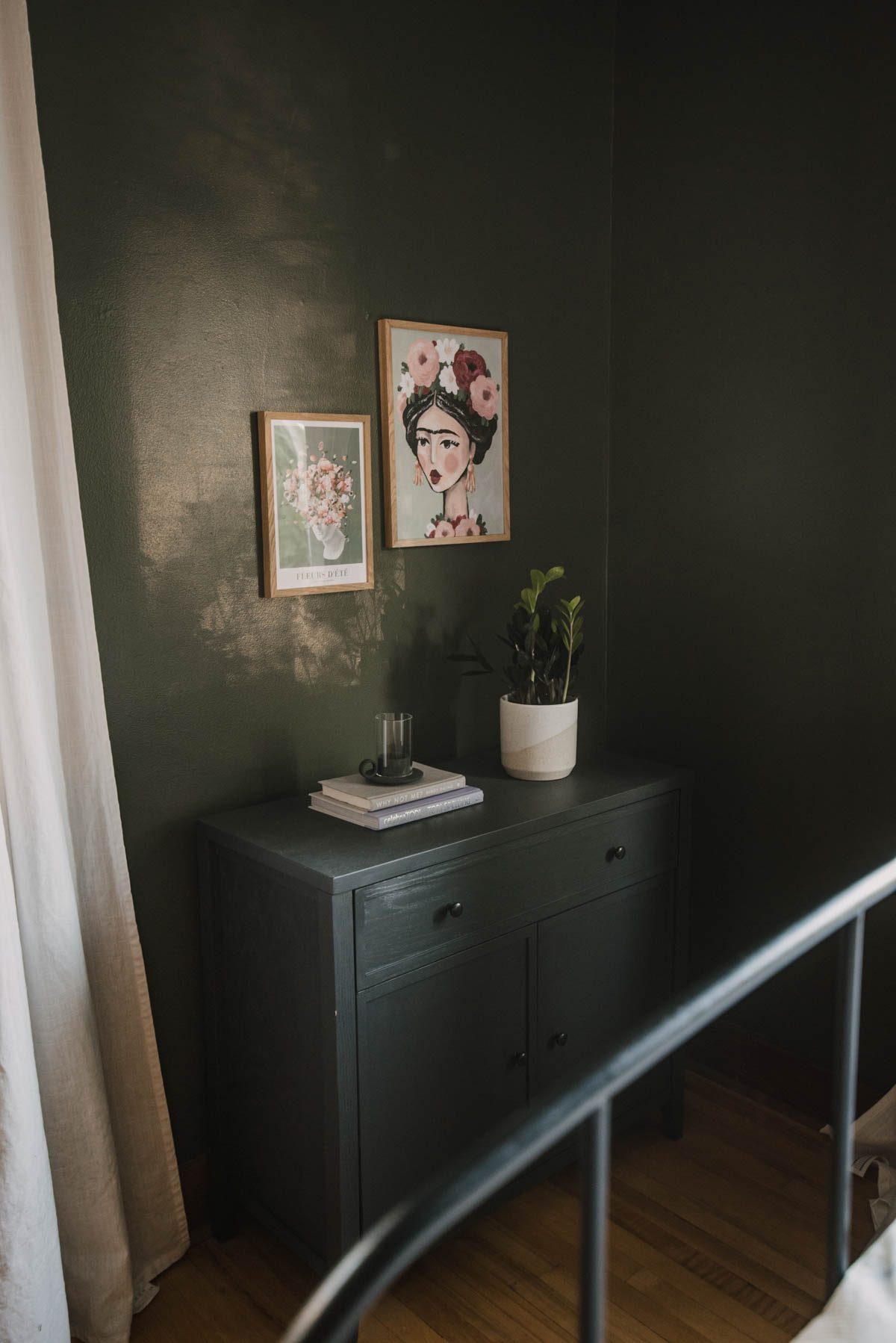 Dark green walls with floral prints