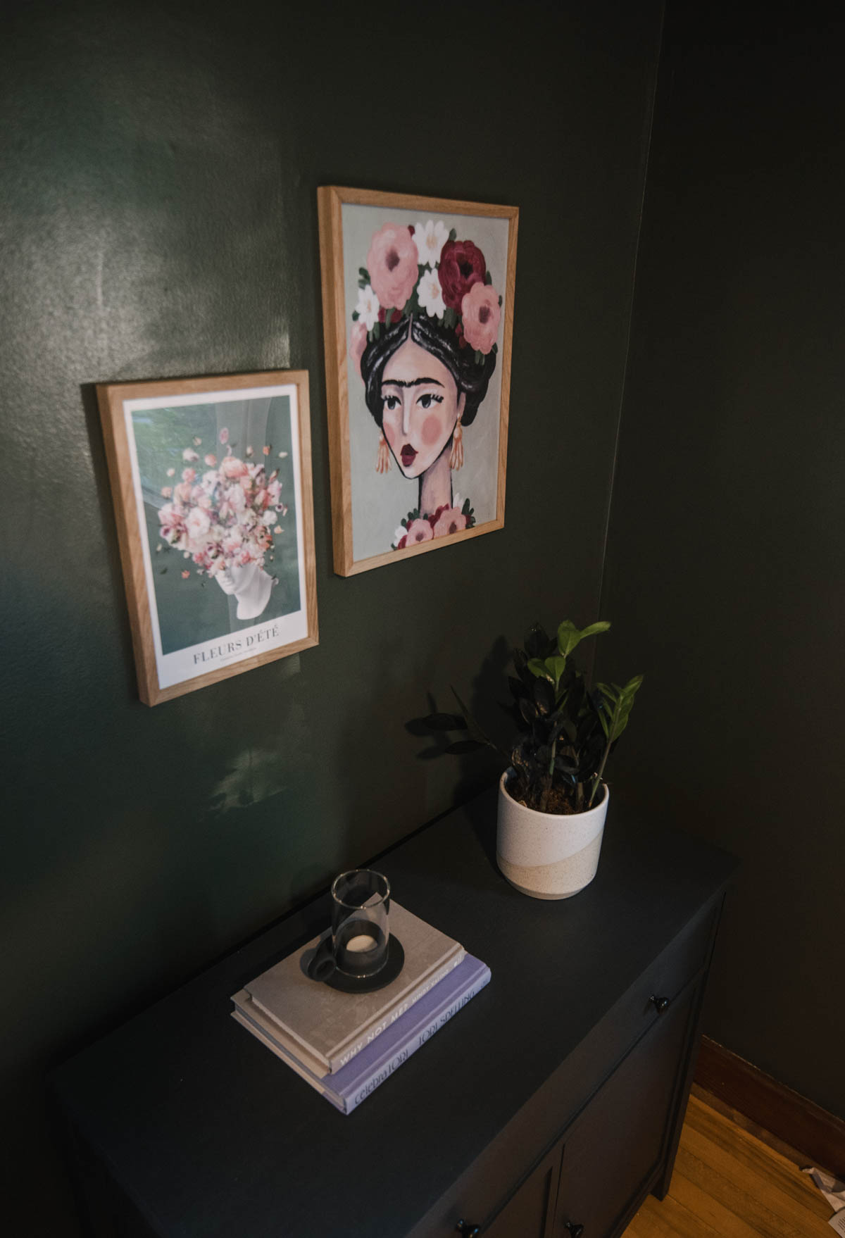 Dark green walls with floral prints 