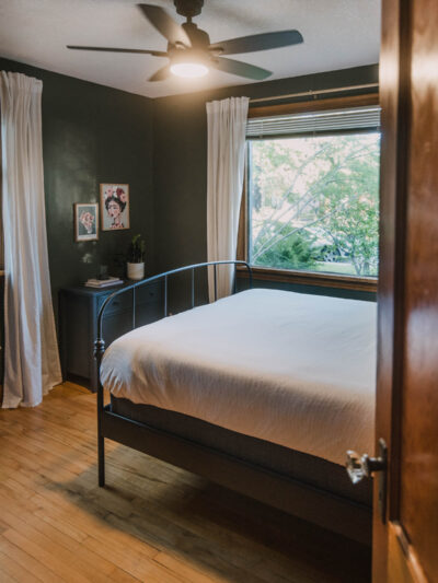 Dark Green Bedroom with wood trim