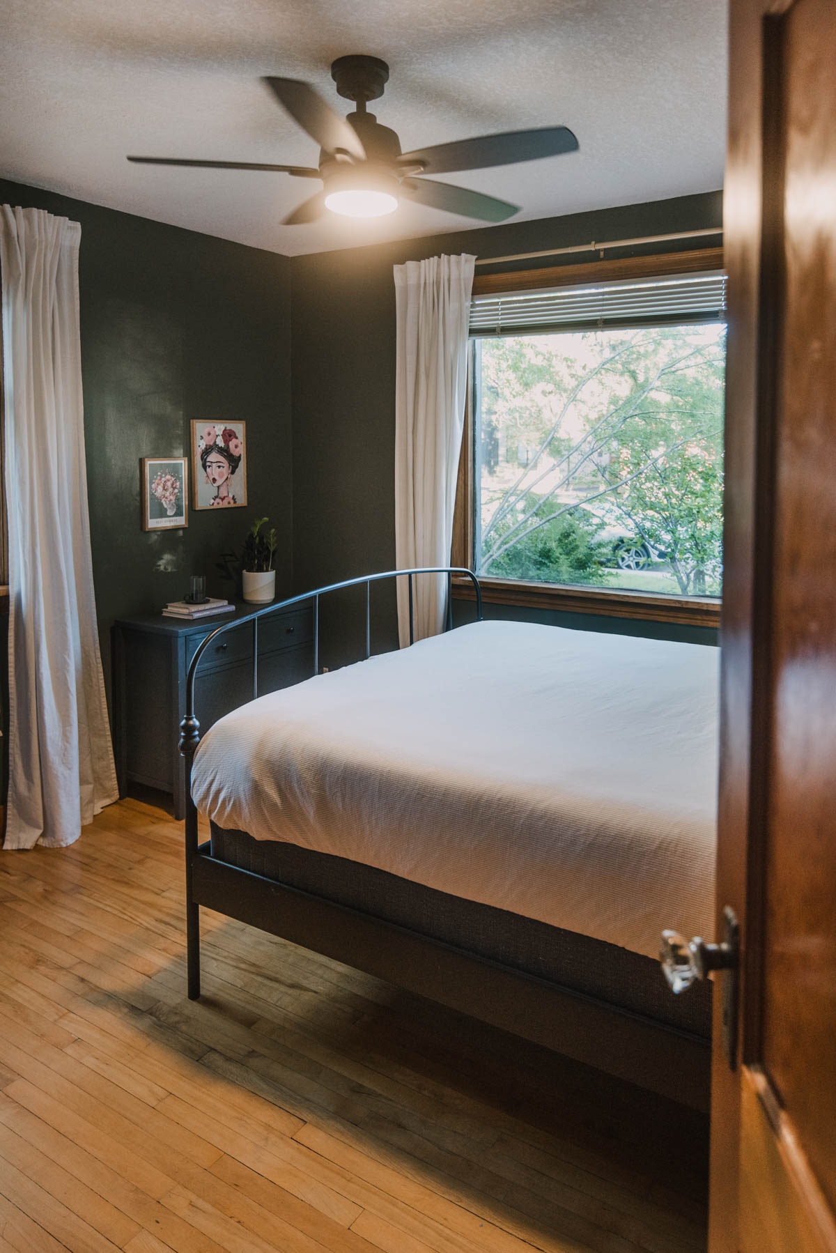 Dark Green Bedroom with wood trim