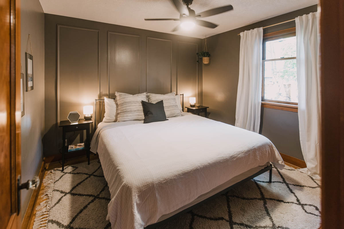 brown bedroom with accent wall