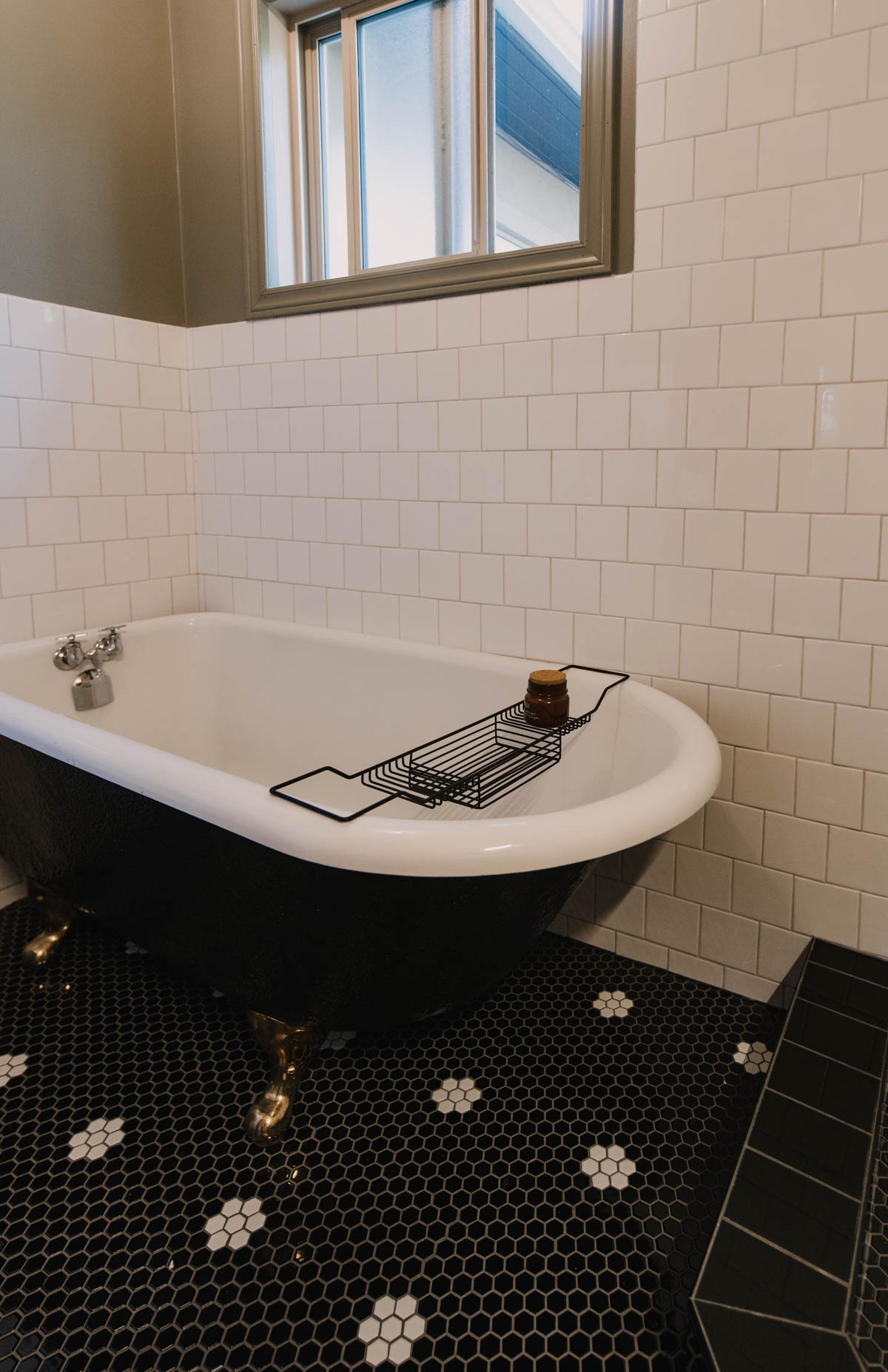 Original Claw foot tub reused in classic modern bathroom makeover