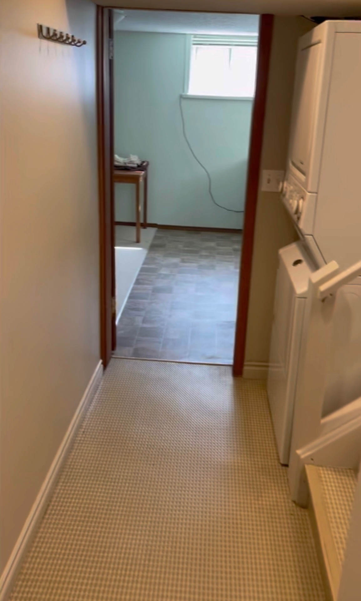 basement suite entry hallway before