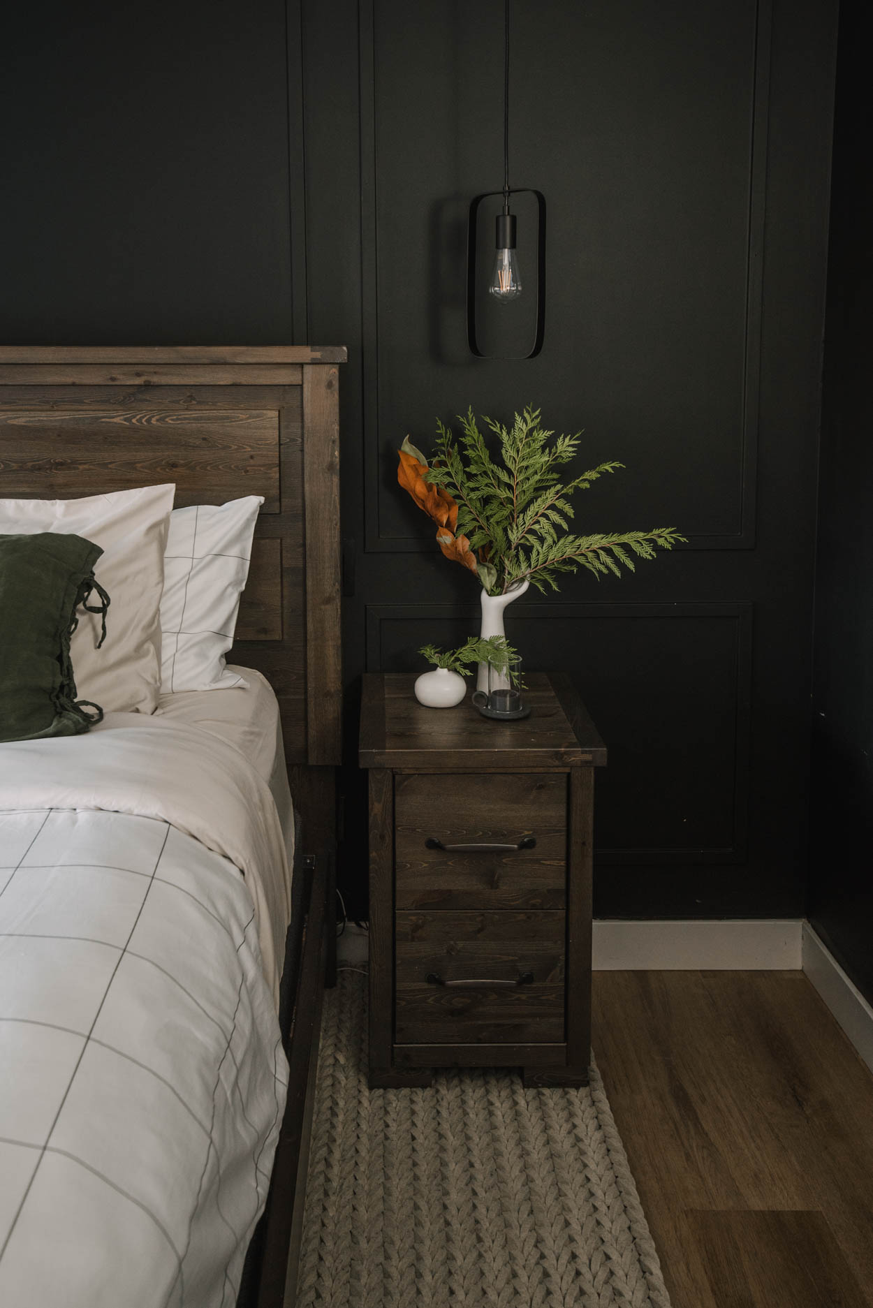 cozy Black bedroom with simple holiday decor