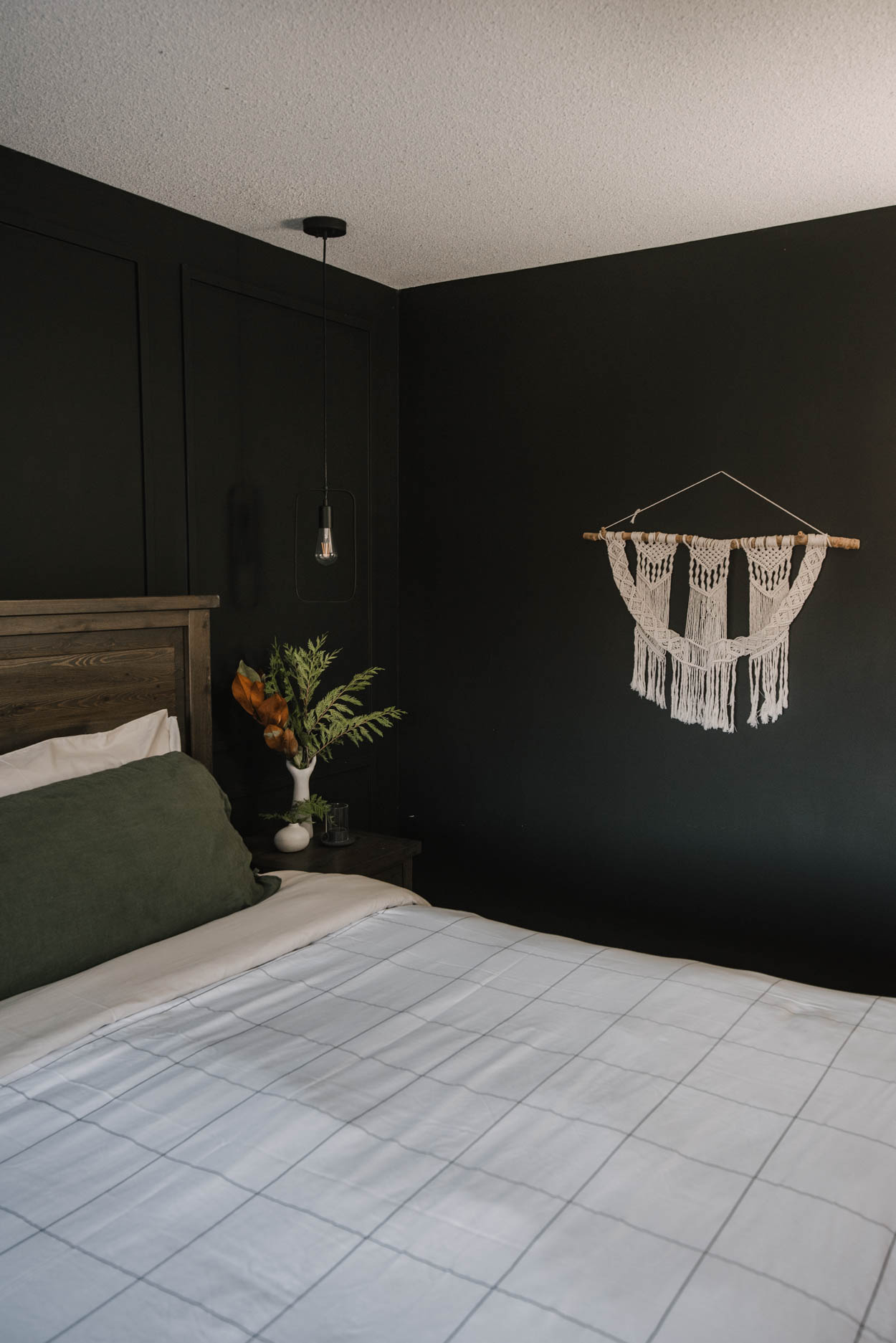 cozy Black bedroom with simple holiday decor