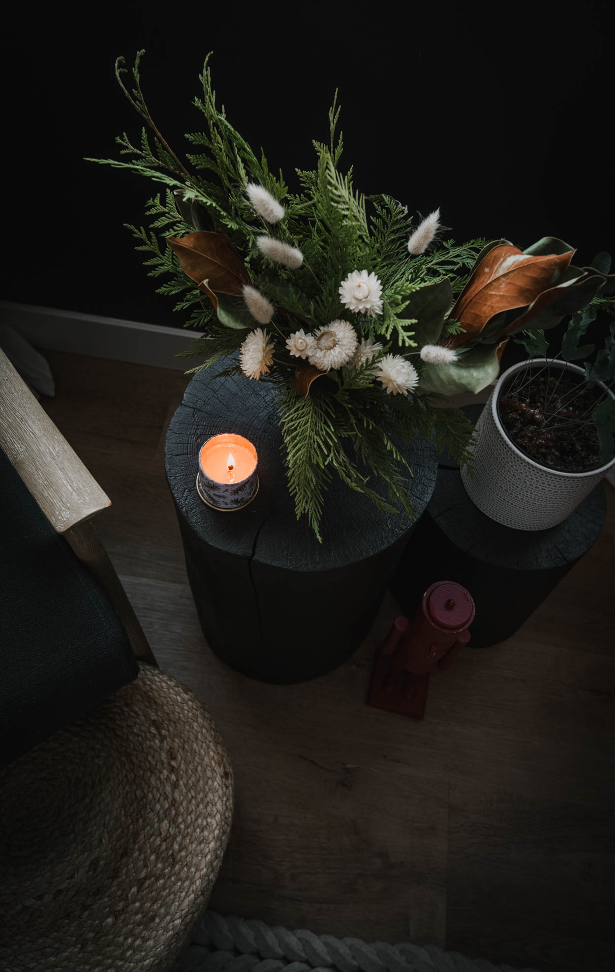 Holiday greenery arrangement with dried florals