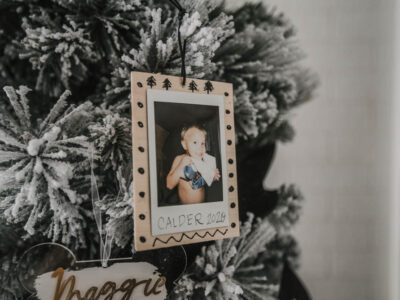 Scandi inspired photo ornaments using instax photos and black ink details on wood