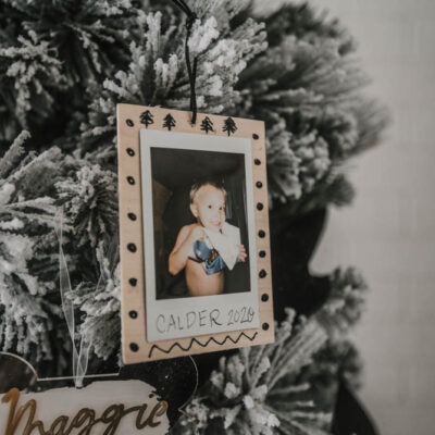 Scandi inspired photo ornaments using instax photos and black ink details on wood