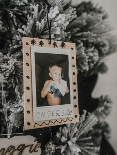 Scandi inspired photo ornaments using instax photos and black ink details on wood