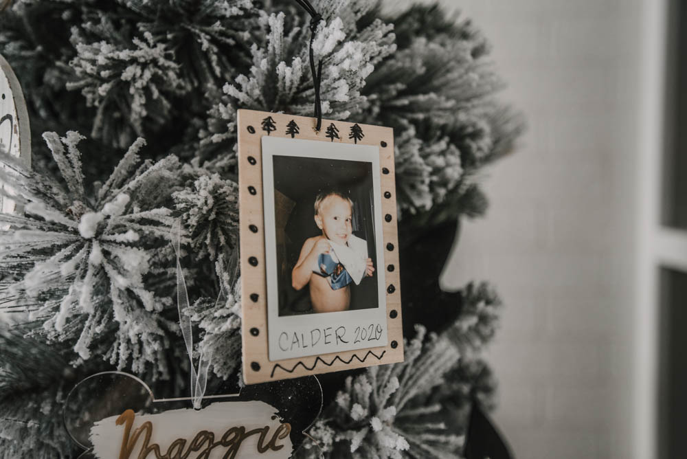 Scandi inspired photo ornaments using instax photos and black ink details on wood