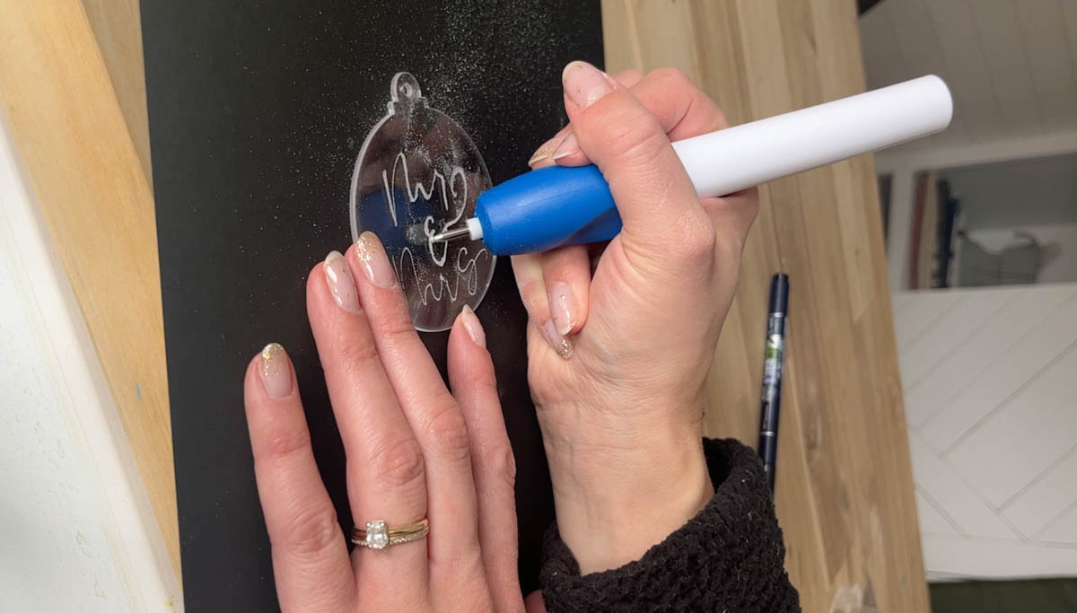 DIY engraved acrylic ornaments- on black paper for contrast