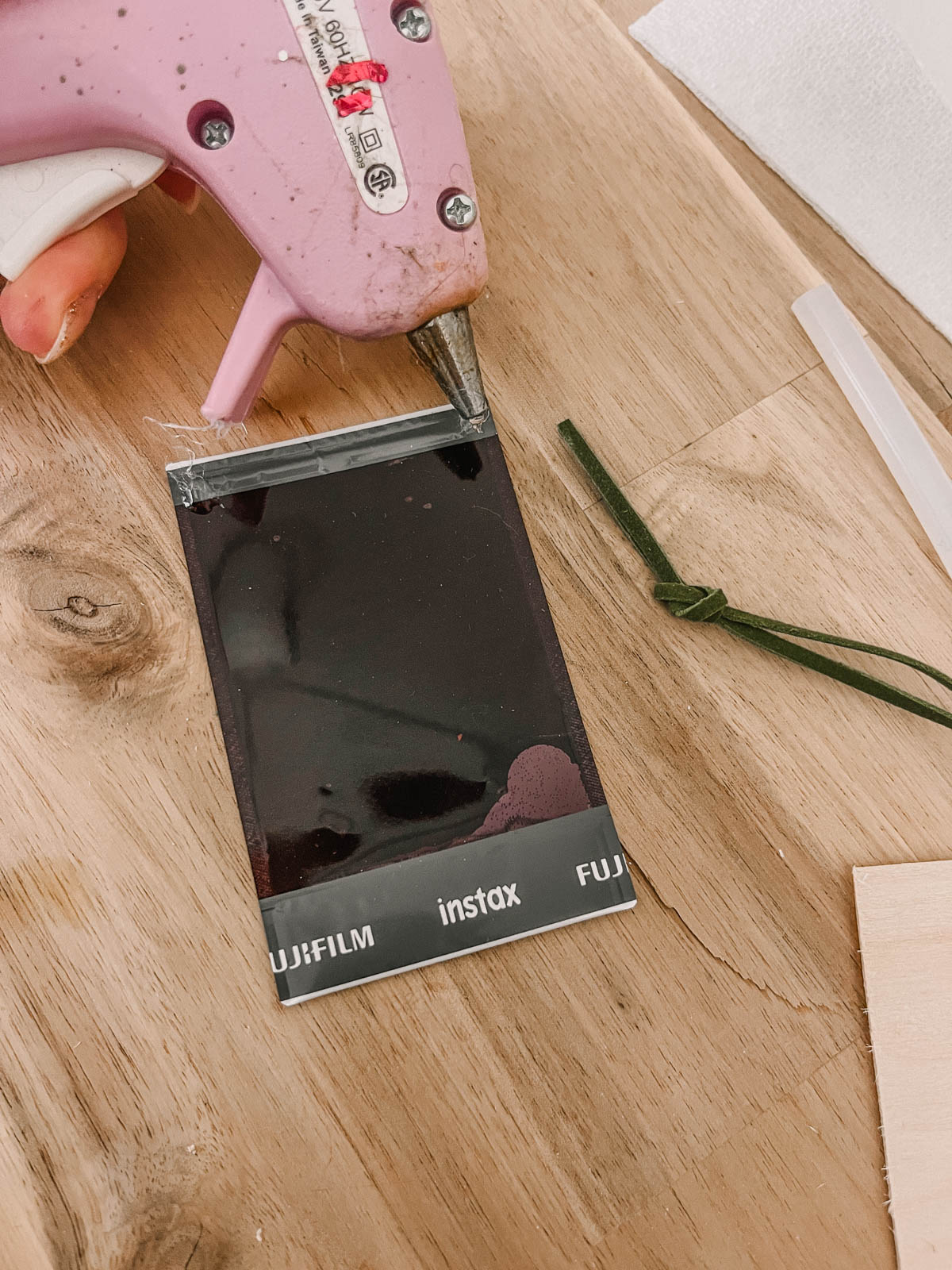 simple wooden photo ornaments- hot glue the photo onto the wood frame