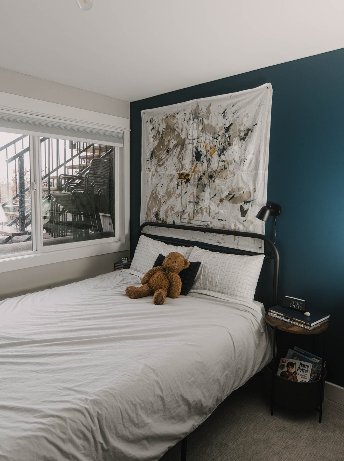 DIY Tween Bedroom decor with moody blue walls and oversized lego wall hanging DIY