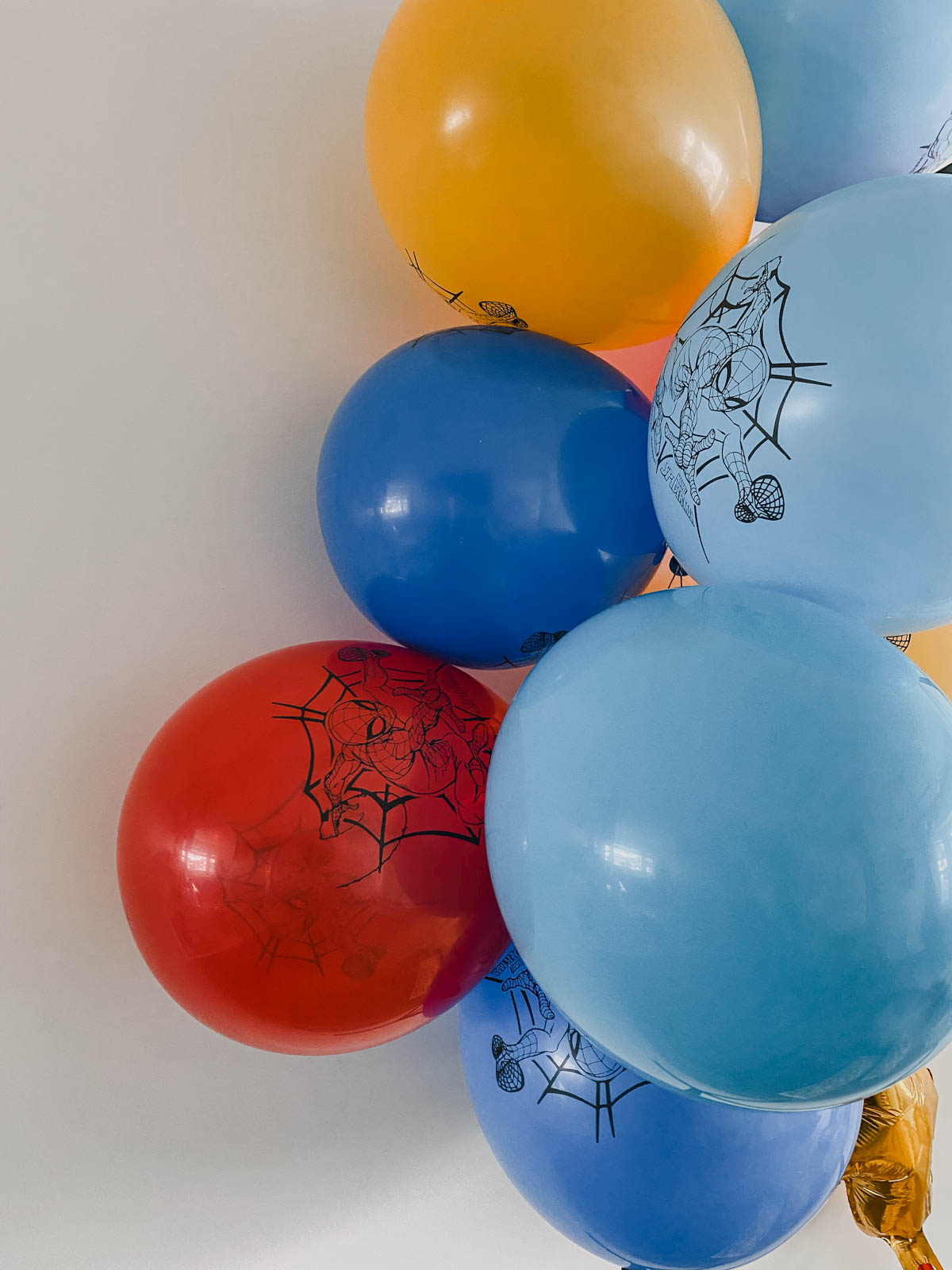 Spiderman balloons for a modern spiderman themed party