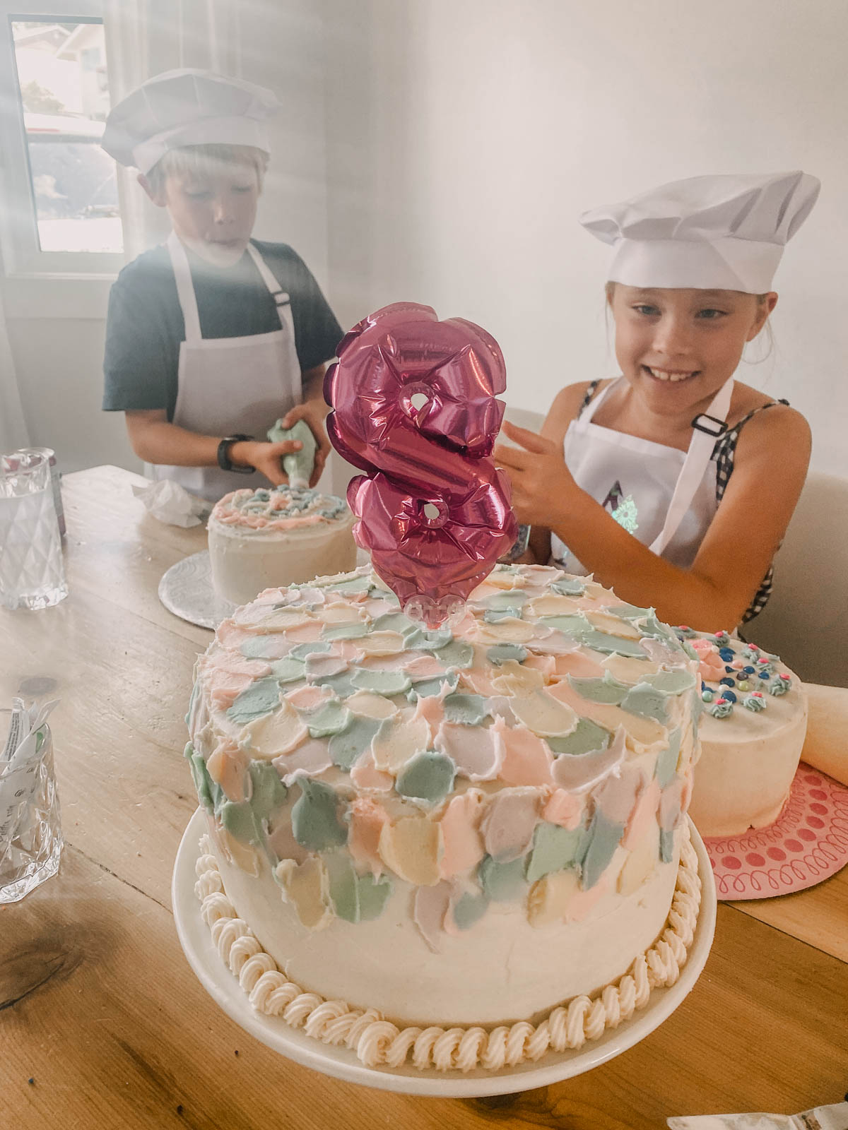 DIY Cake Decorating Party- modern pastel cake with 8 balloon on top