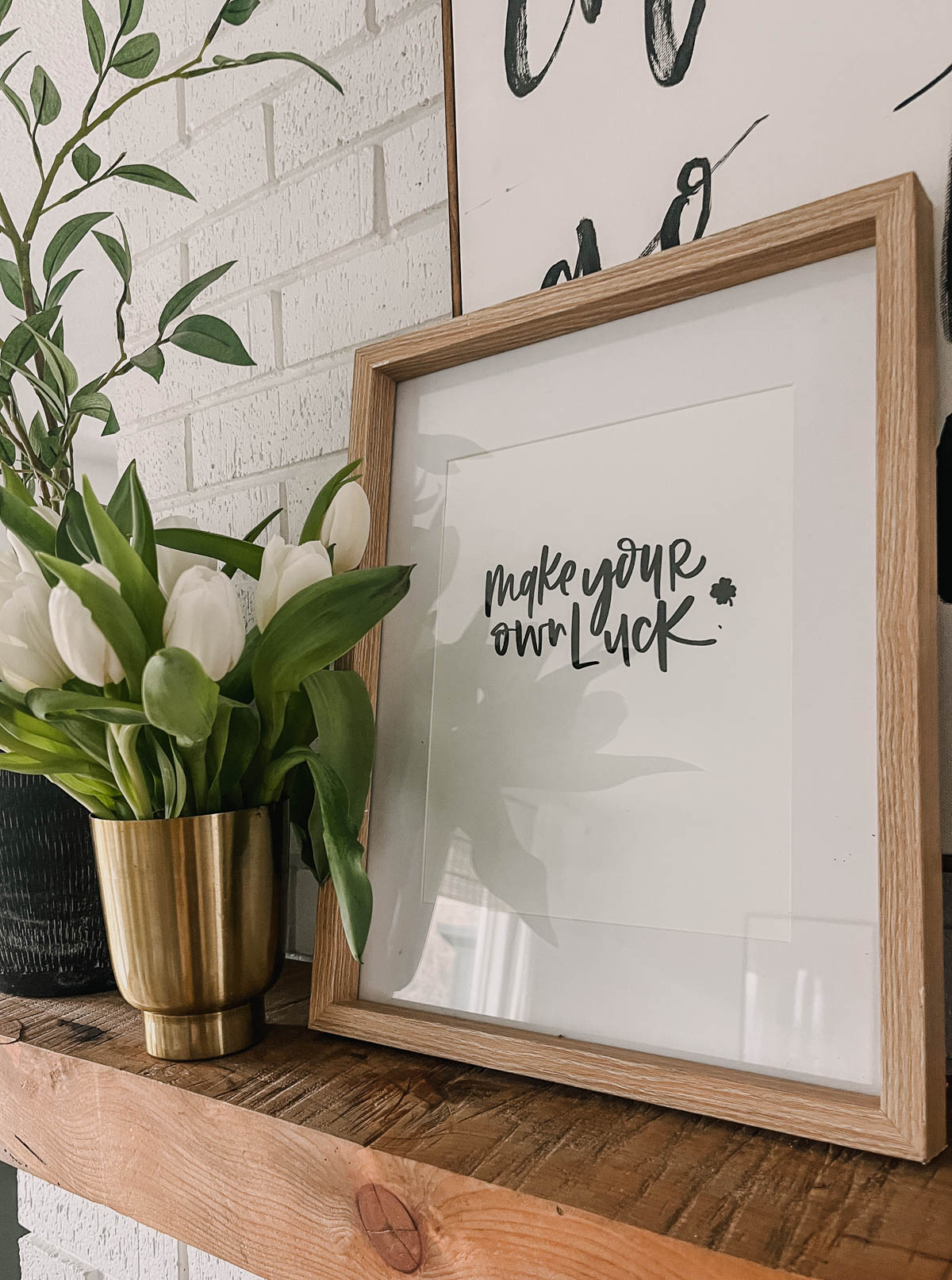 make your own luck hand lettered printable framed on mantel