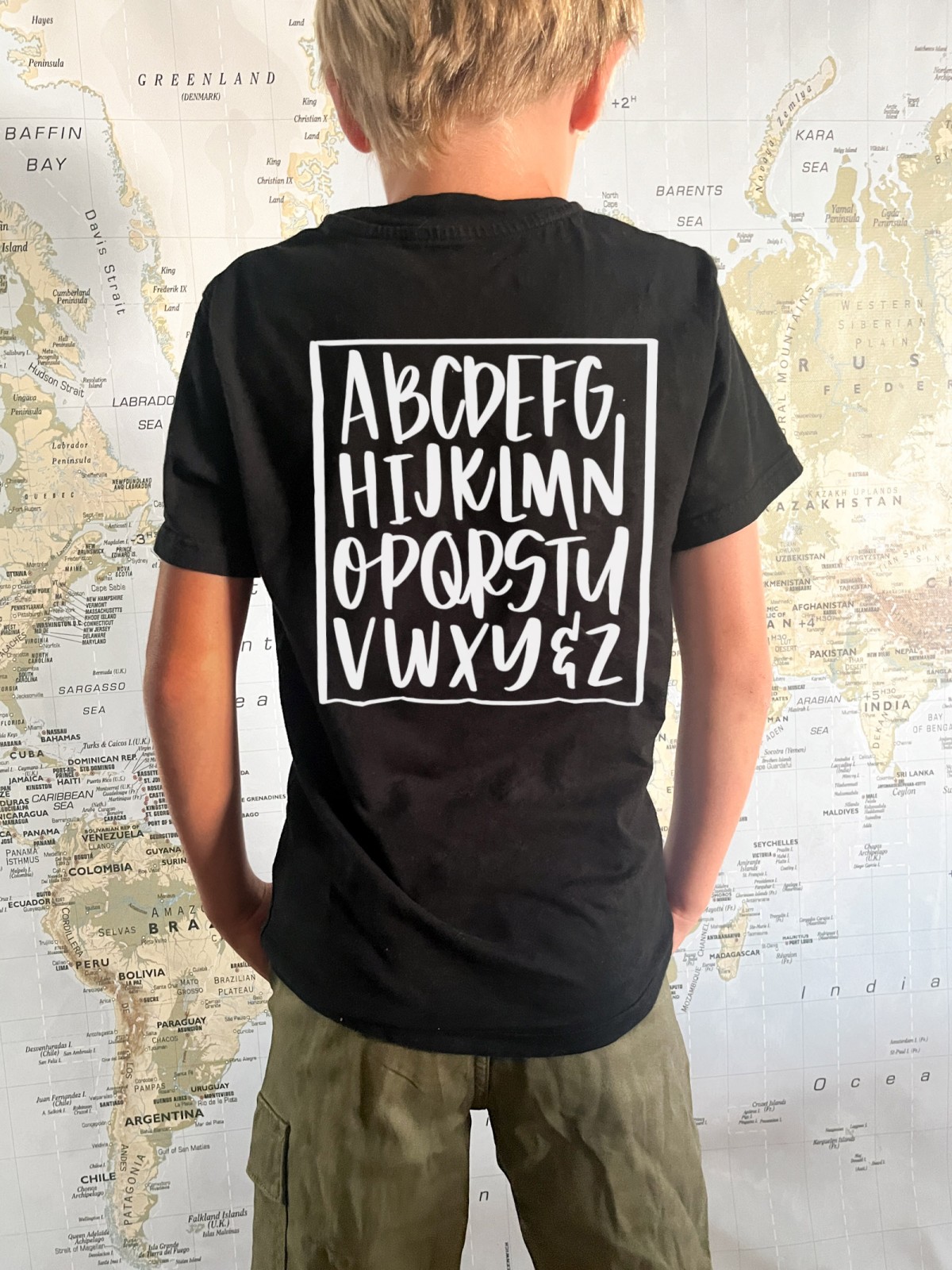 simple white alphabet on back of black teeshirt using free SVG design