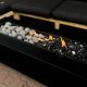 long rectangle fire table with lava pebbles and reflective black fire glass for a fire table media comparison
