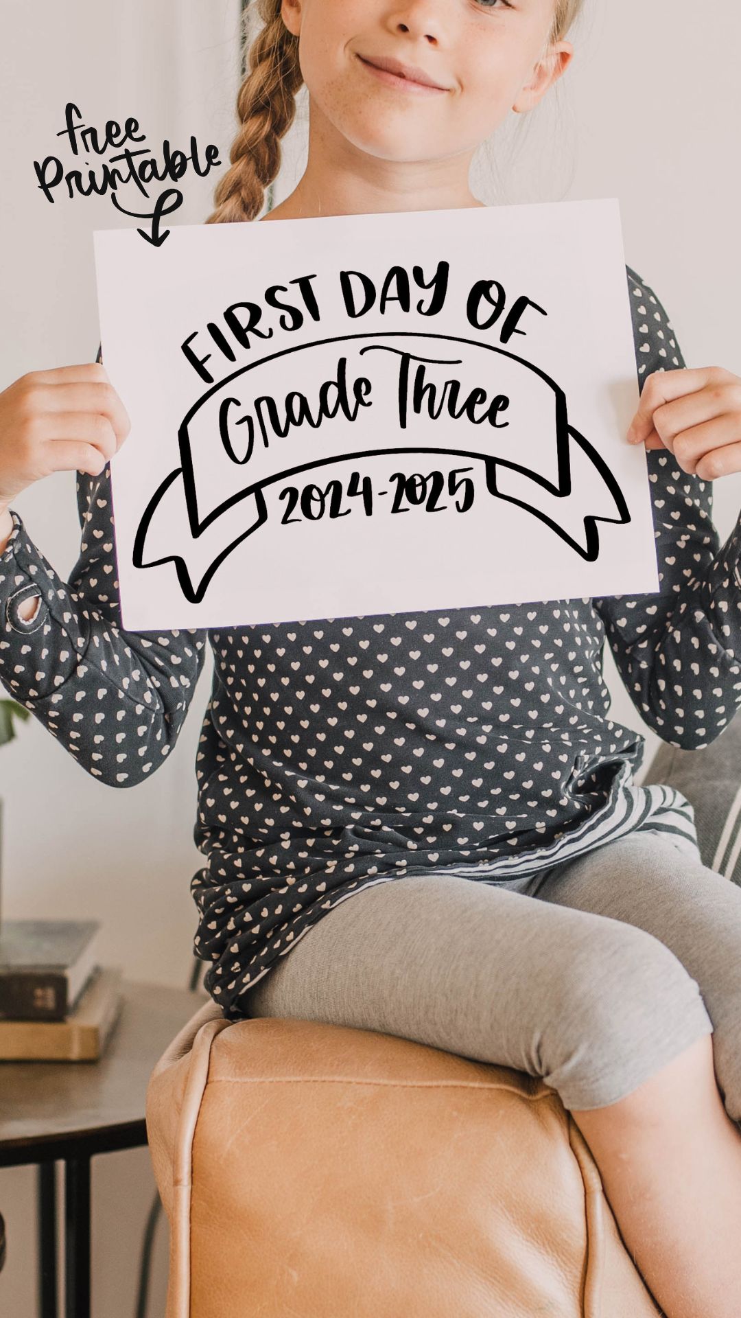 image of girl holding a 'first day of grade three 2024-2025' sign text over reads 'free printable!'