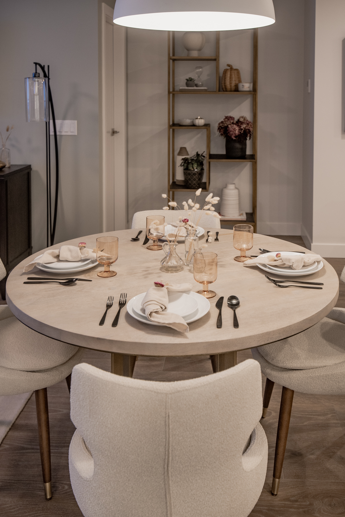 Minimalistic fall tablescape with dried grasses and strawflowers