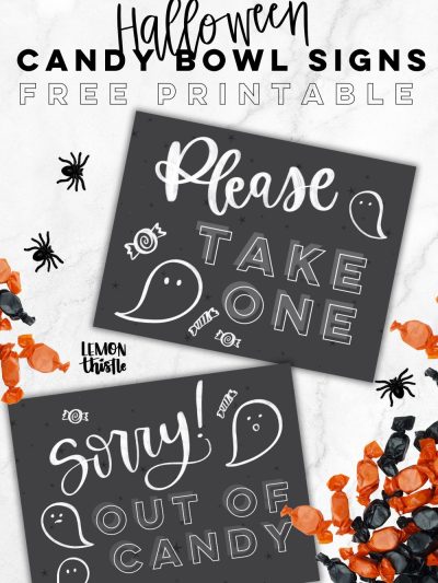 Free printable halloween candy signs, image of signs on a countertop with halloween candy. signs read: please take one and sorry out of candy
