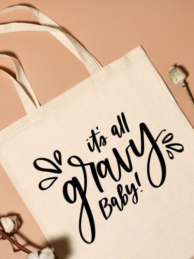 it's all gravy baby free svg file on tote bag flatlay photo