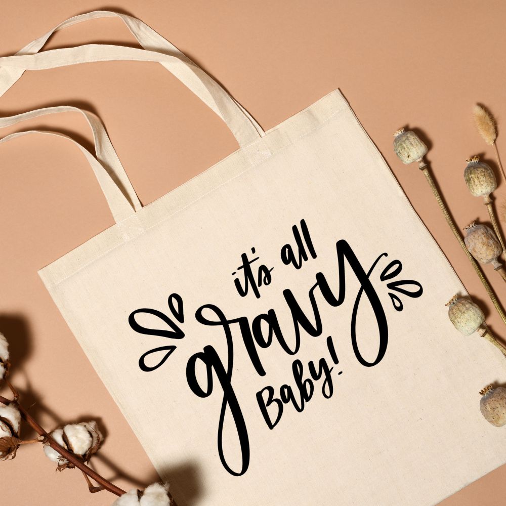 it's all gravy baby free svg file on tote bag flatlay photo