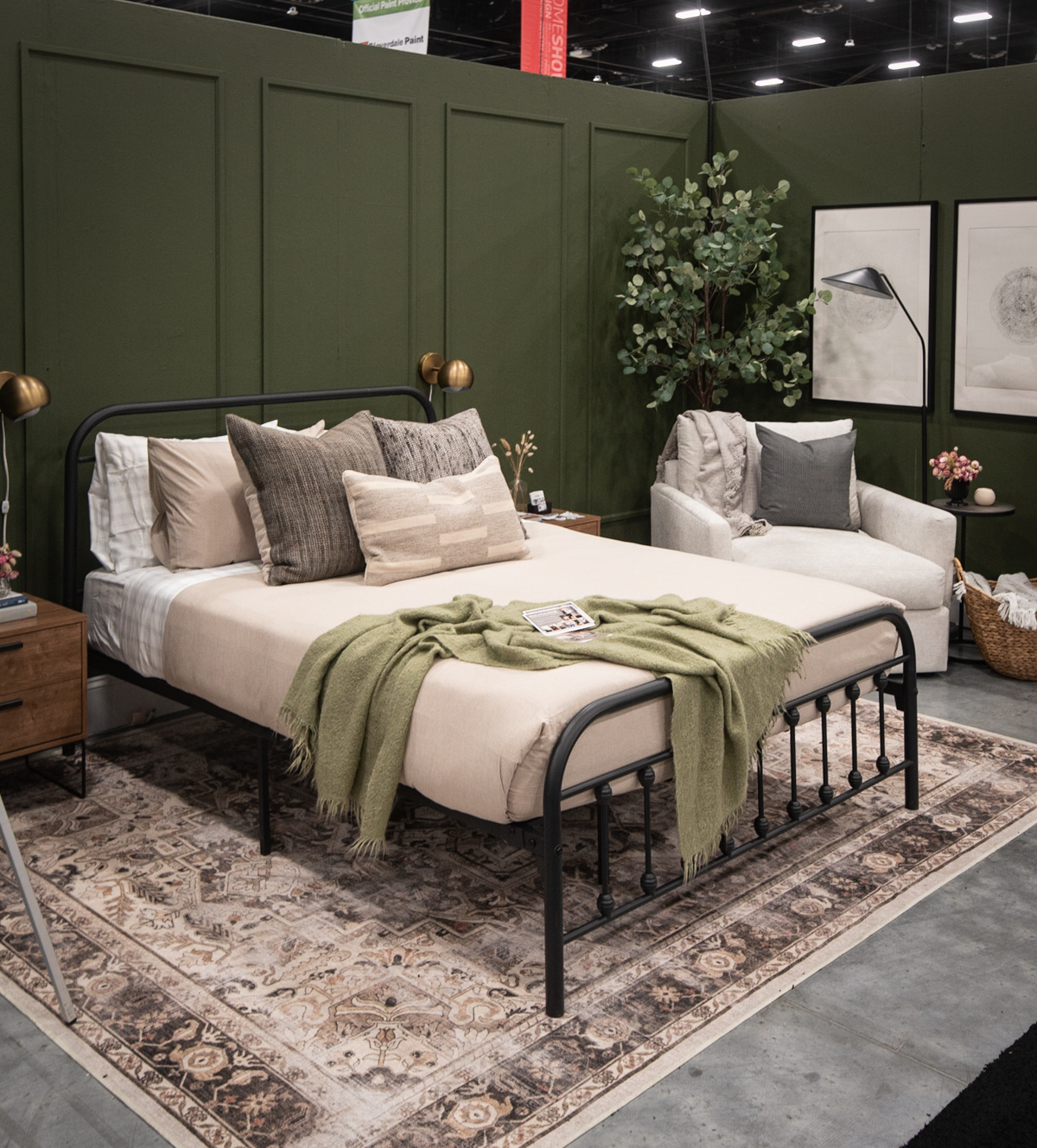 Cozy green bedroom with DIY wood round prints