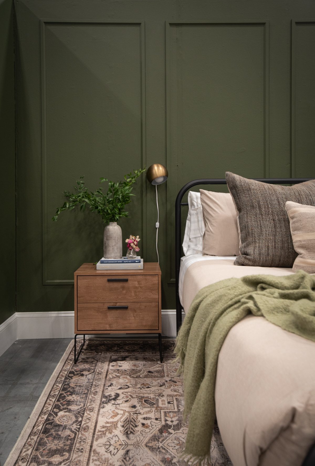 Moody green bedroom design at the calgary home show