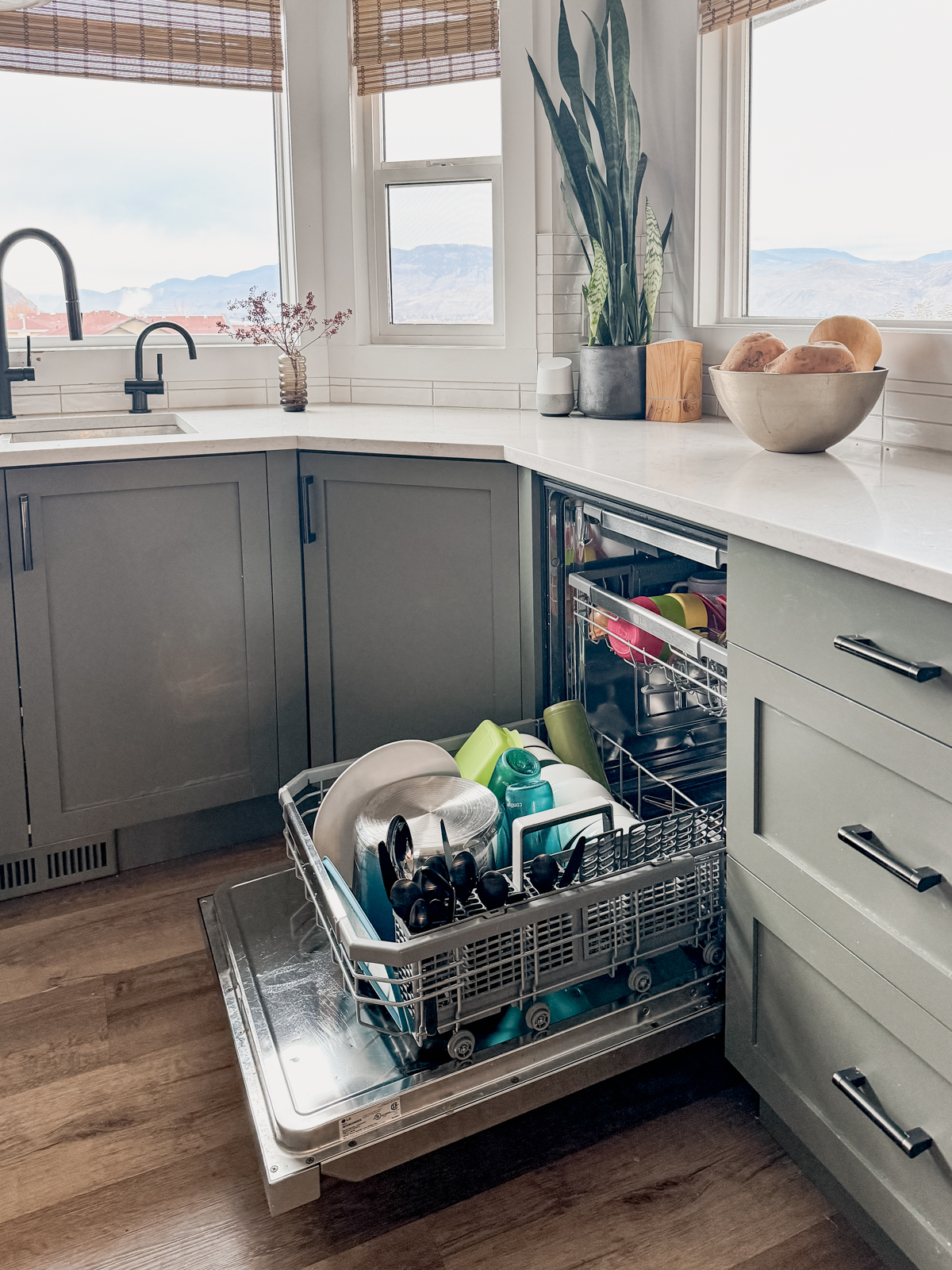 open dishwasher full of clean dishes