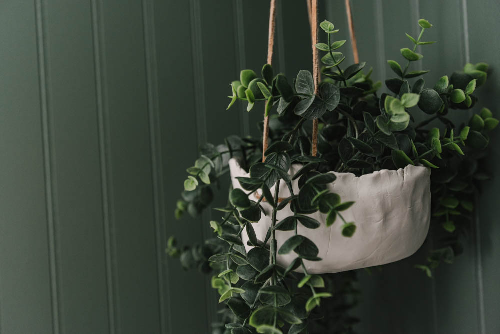 DIY hanging planter out of oven bake clay for a neutral but textured bathroom accent