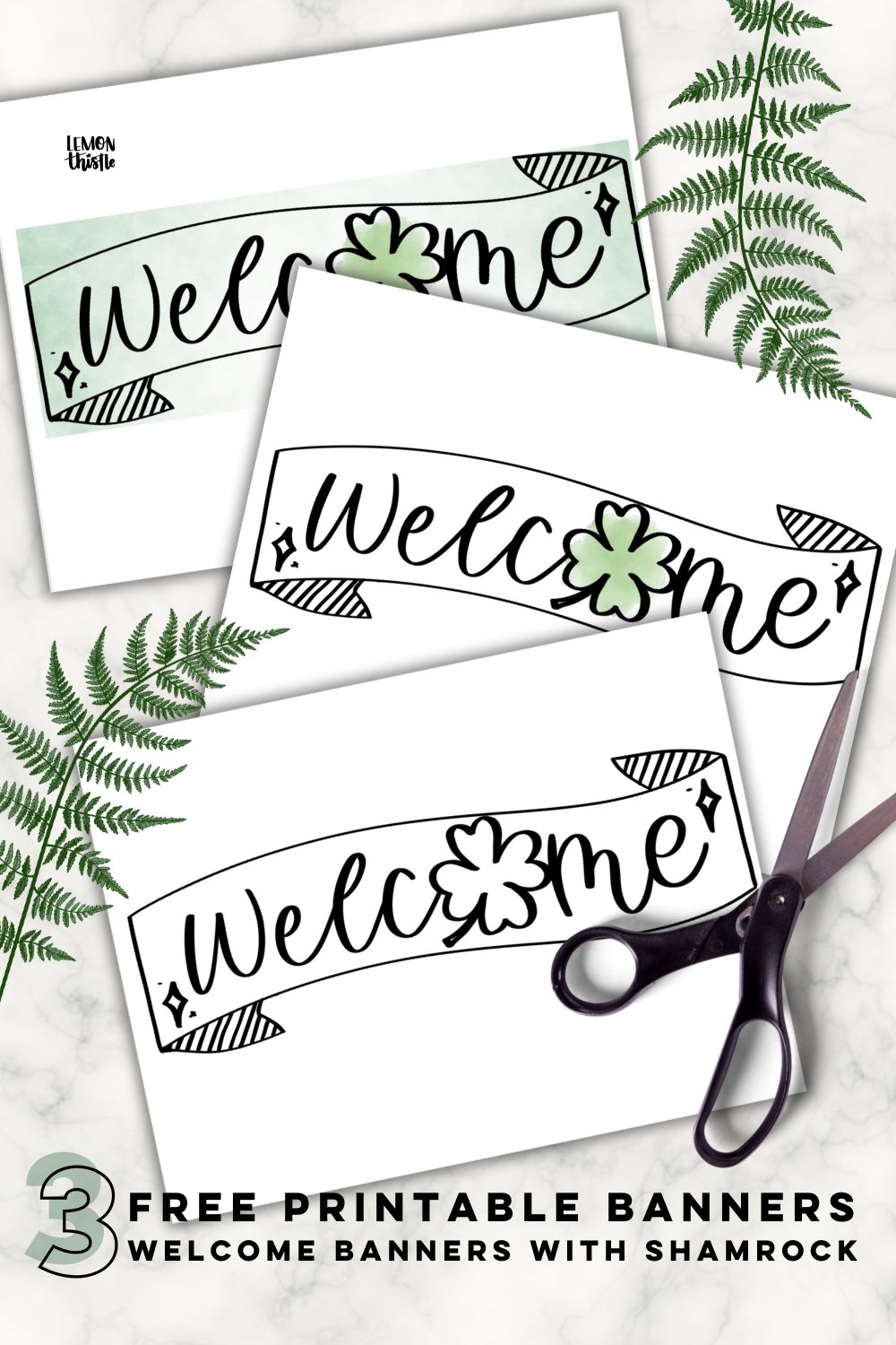 3 printed papers with welcome banners and shamrock as the O - hand lettered designs each with different amounts of color. styled on marble countertop with black scissors and fern leaf text overlay reads: 3 free printable banners welcome banners with shamrock