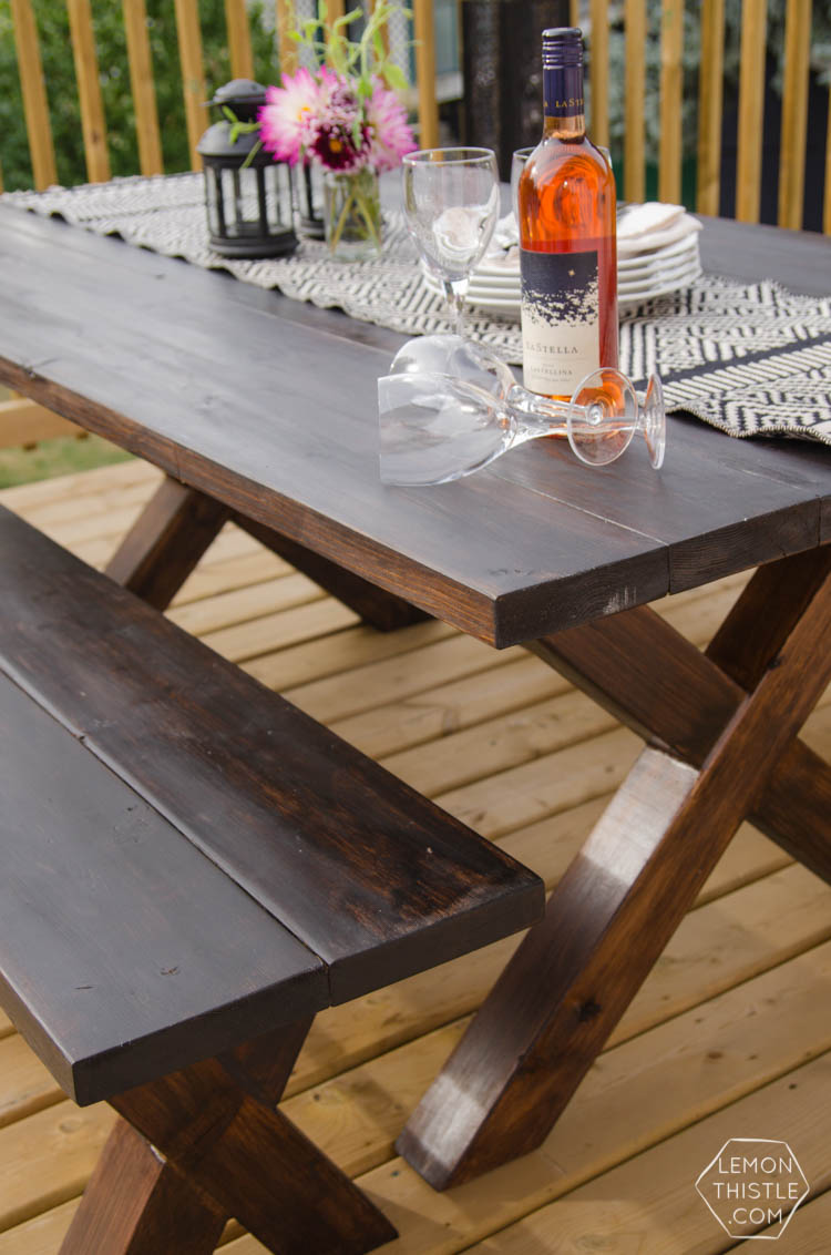 a diy table built from 2 x 8 SPF and cedar 4 x 4 wood, image in a blog post about choosing wood for diy projects