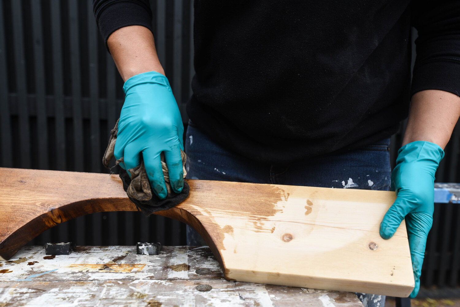 image shows staining 2x6 SPF wood for a DIY project