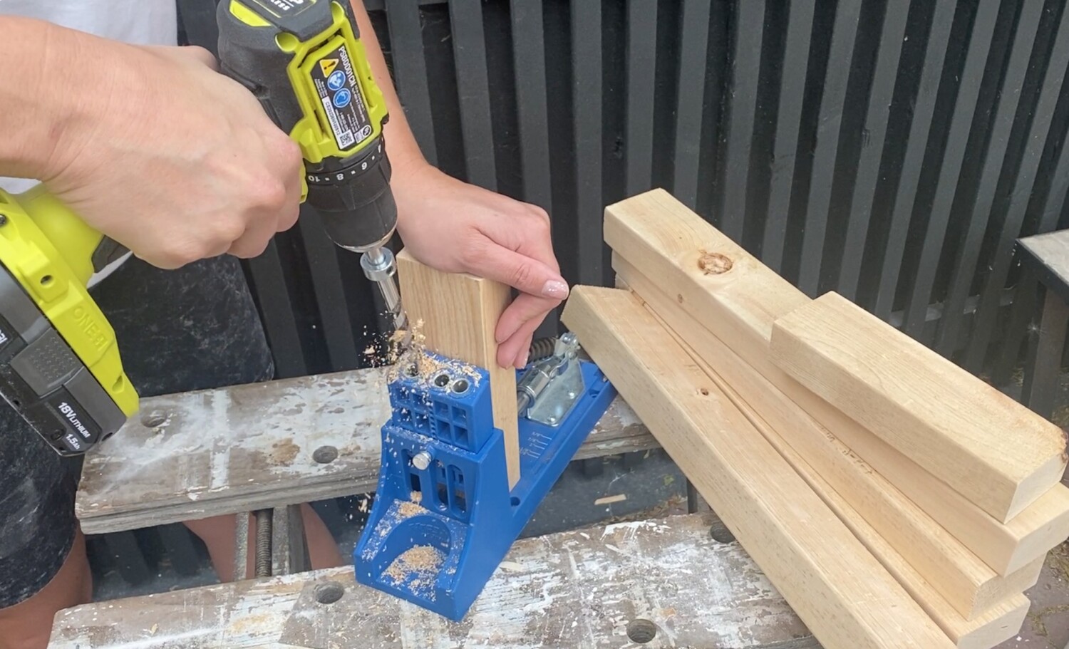 image of SPF 2x3 wood being drilled with a pocket hole jig